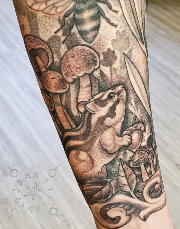 Black and grey chipmunk sleeve tattoo by John Campbell at Sacred Mandala Studio tattoo parlor in Durham, NC.